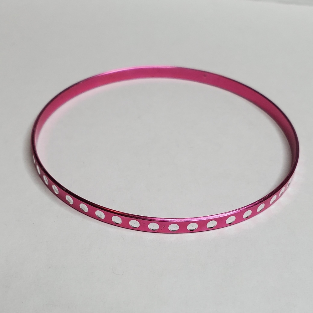 Hot pink bangle bracelet with white dots around